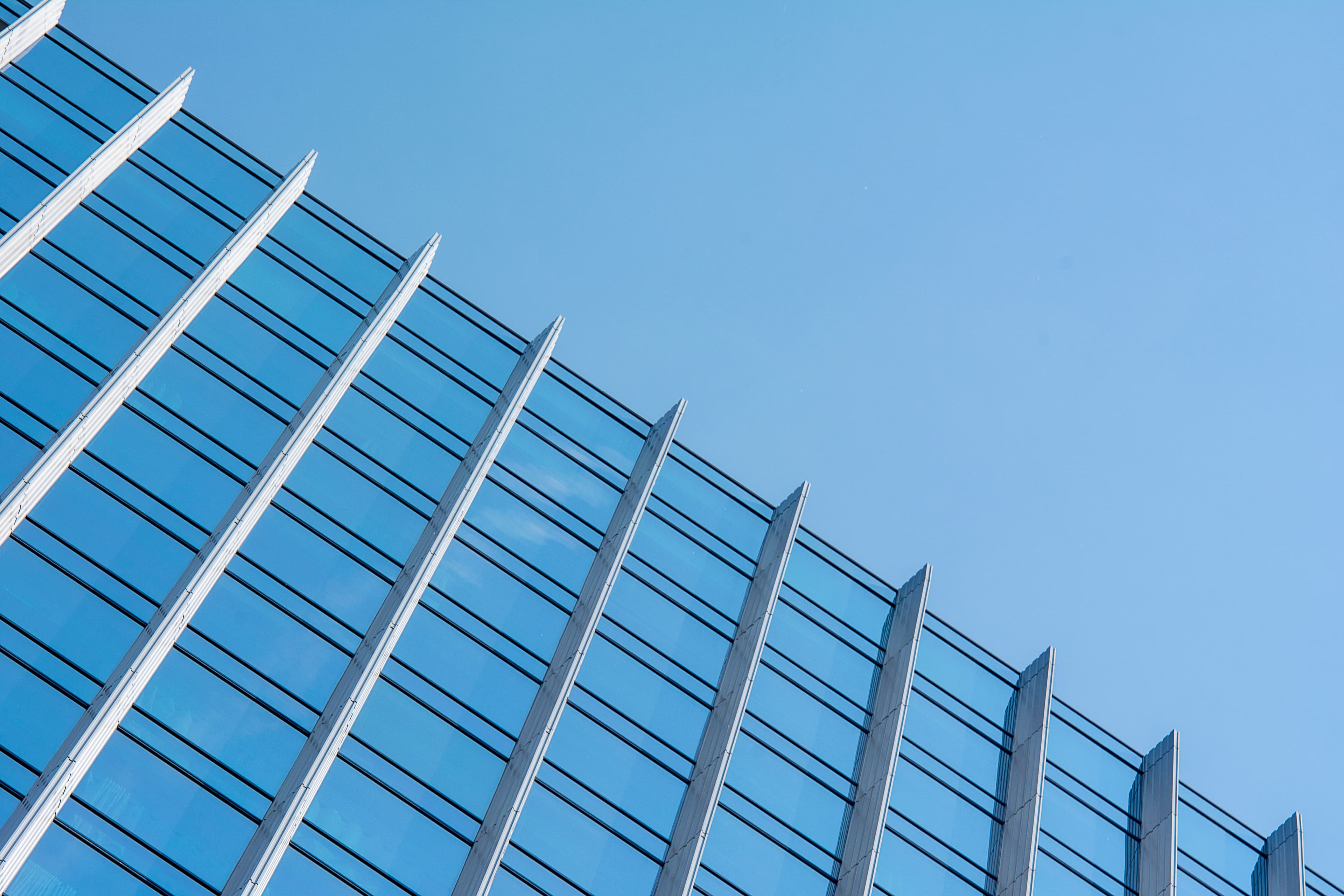 Glass curtain-wall facade of a corporate tower