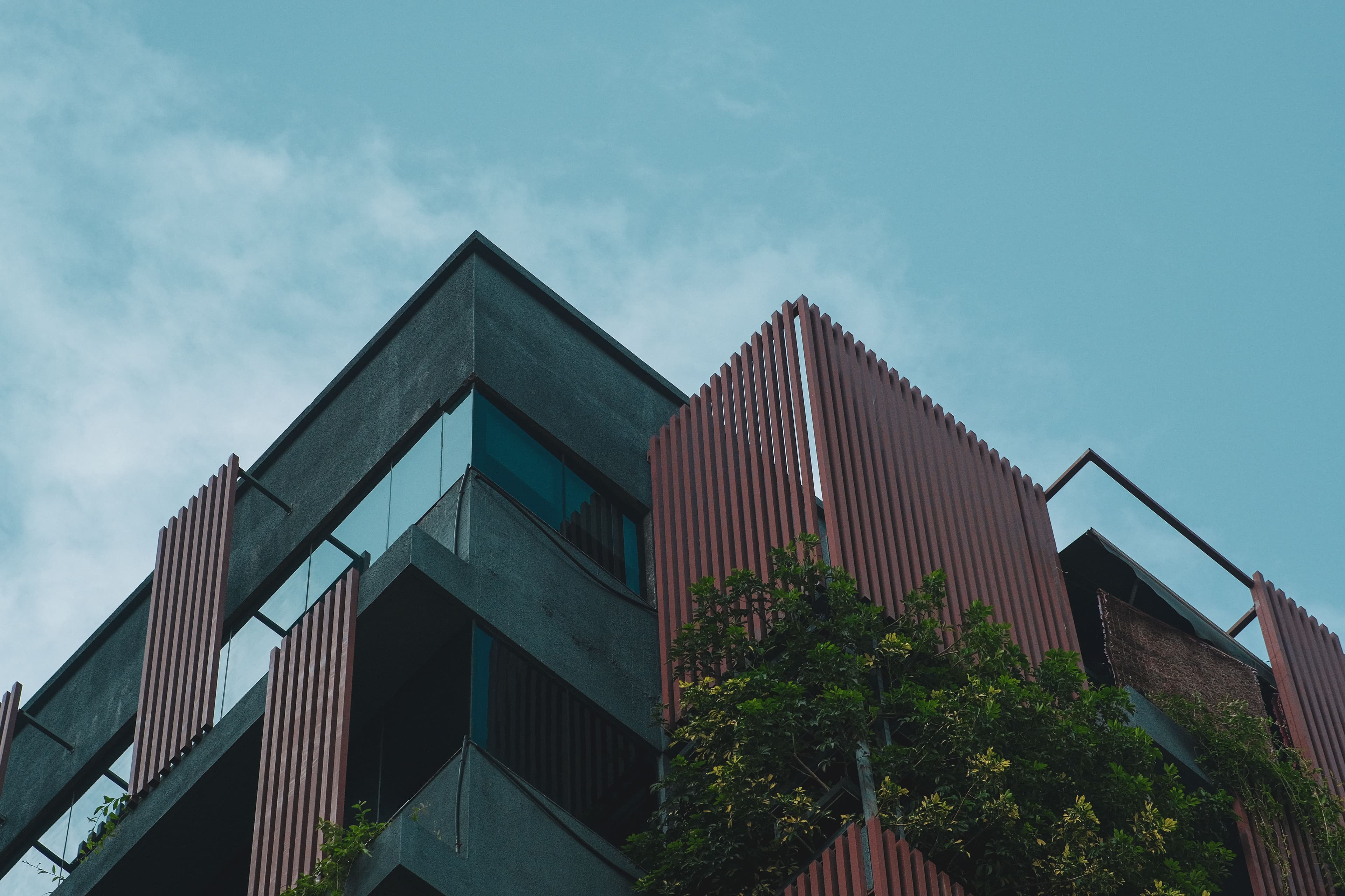 Modern office building facade seen from below